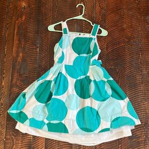 Blue poka dots, layered shirt, with tie in the back adjustable, size 12 girl